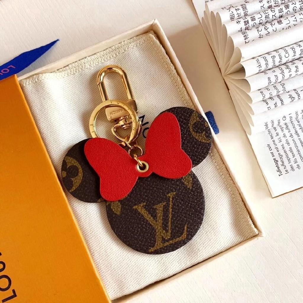 louis vuitton keychain in shape of mickey mouse red leather with gold accents