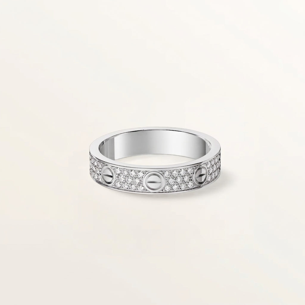 delicate silver band ring with small clear stones