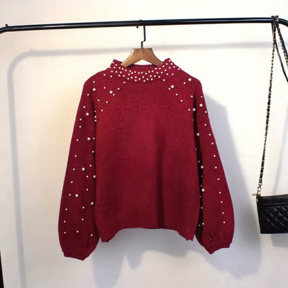 red pearl studded sweater